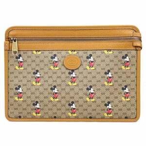 Gucci Disney collaboration clutch bag brown GG Supreme canvas pattern